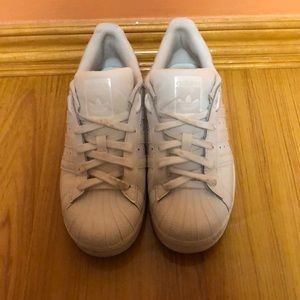 All white Adidas shoes